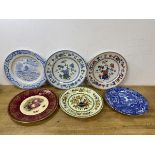 Two Royal Worcester china plates with chinoiserie pattern, one blue and green, the other red and