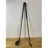 Two children's hickory shafted golf clubs, the wood stamped Brassey to base,