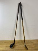 Two children's hickory shafted golf clubs, the wood stamped Brassey to base,