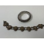 A French bracelet formed of seven panels each with a city crest, such as Vannes, Nantes, Brest,