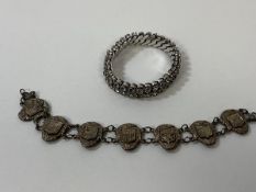 A French bracelet formed of seven panels each with a city crest, such as Vannes, Nantes, Brest,