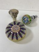 A mixed lot including a paperweight, a wine stopper with paperweight designed knopp, and cork wine