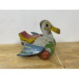 A vintage child's pull toy in the form of a bird, marked Union to top, (20cm high)