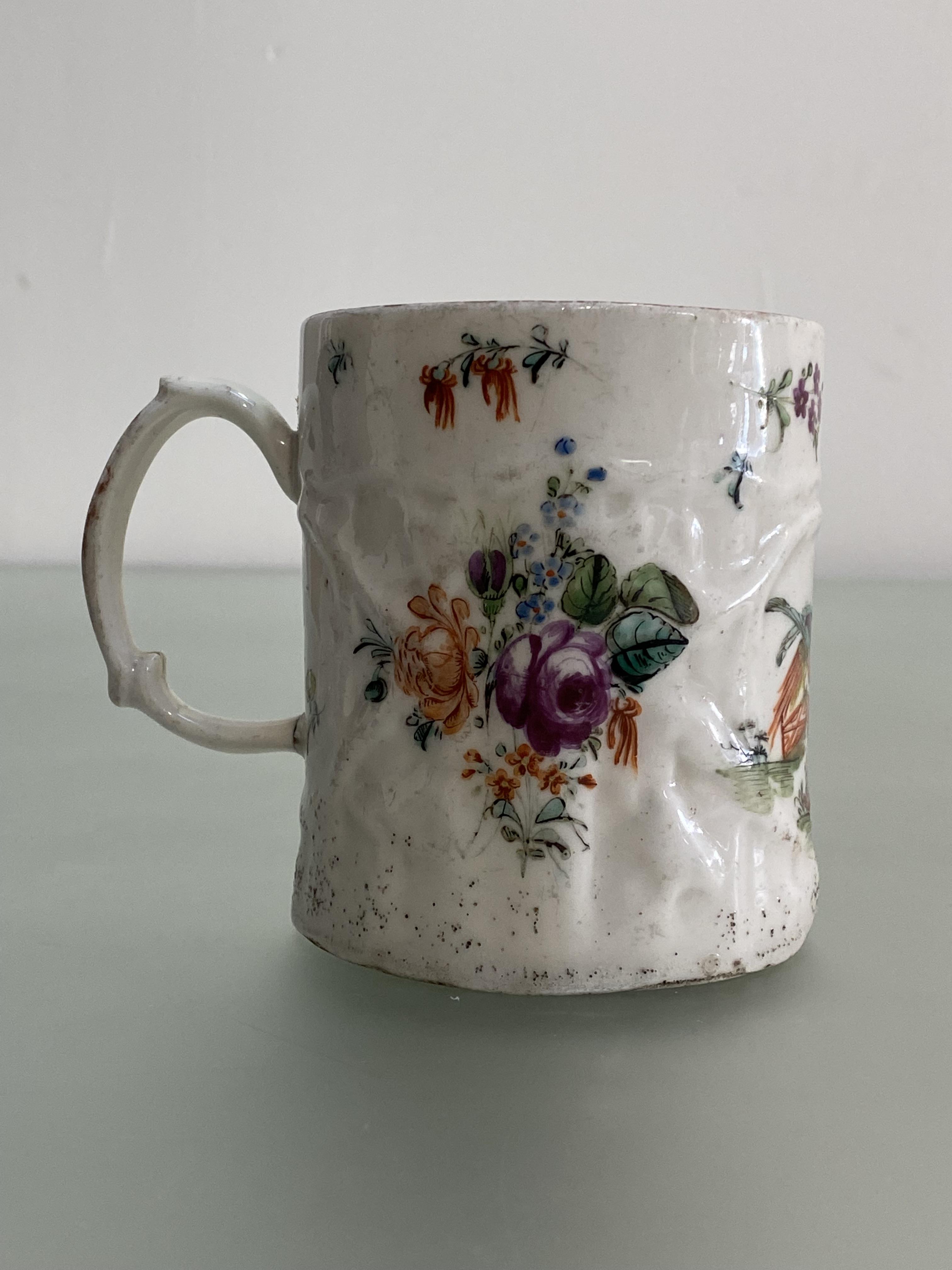 A rare West Pans porcelain mug, c. 1770, of cylindrical form, moulded with scrolling foliage and - Image 2 of 4