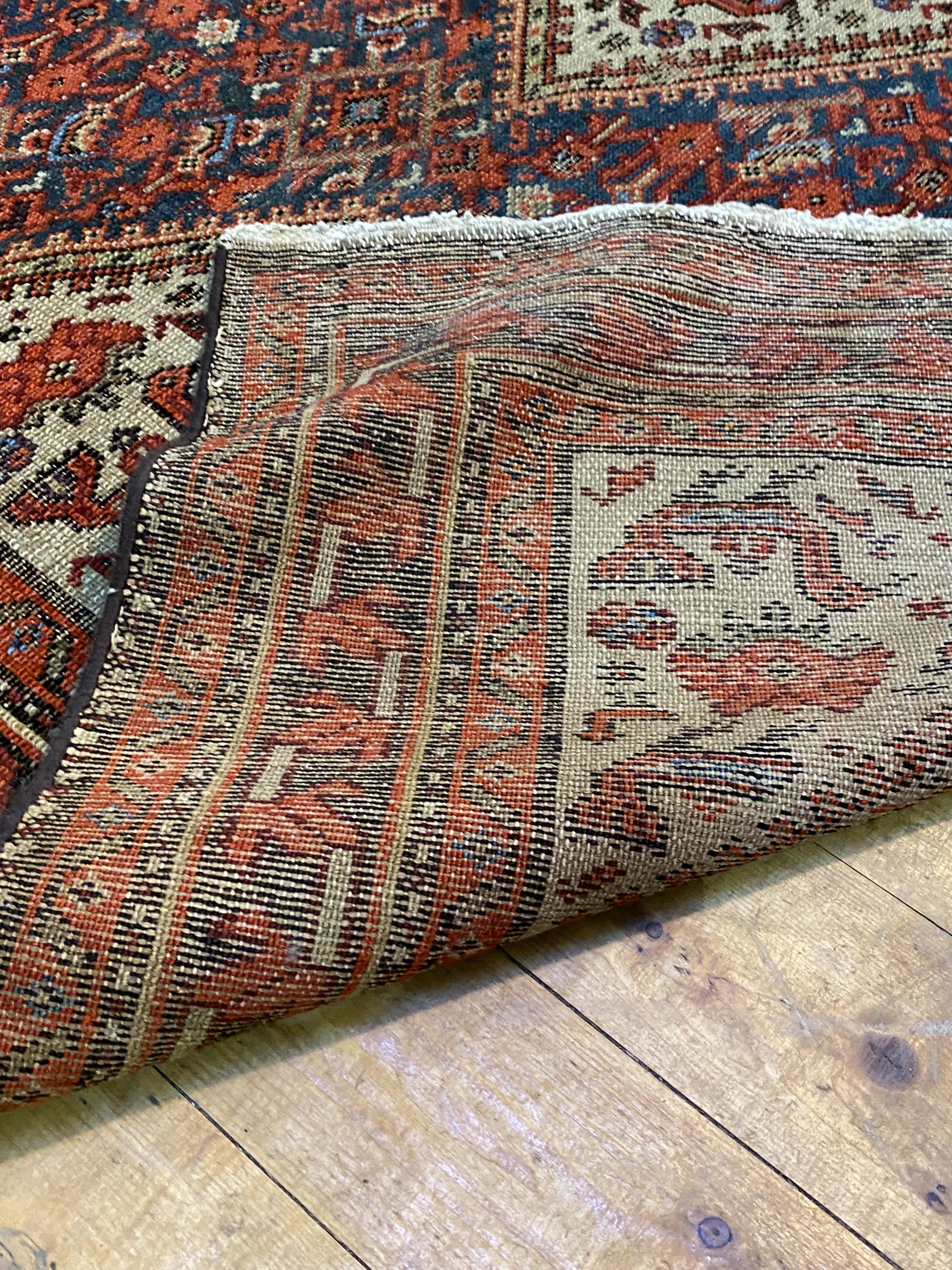 An old Caucasian runner rug, the central field with pole medallion and stylised bird motif, 407cm - Image 3 of 3