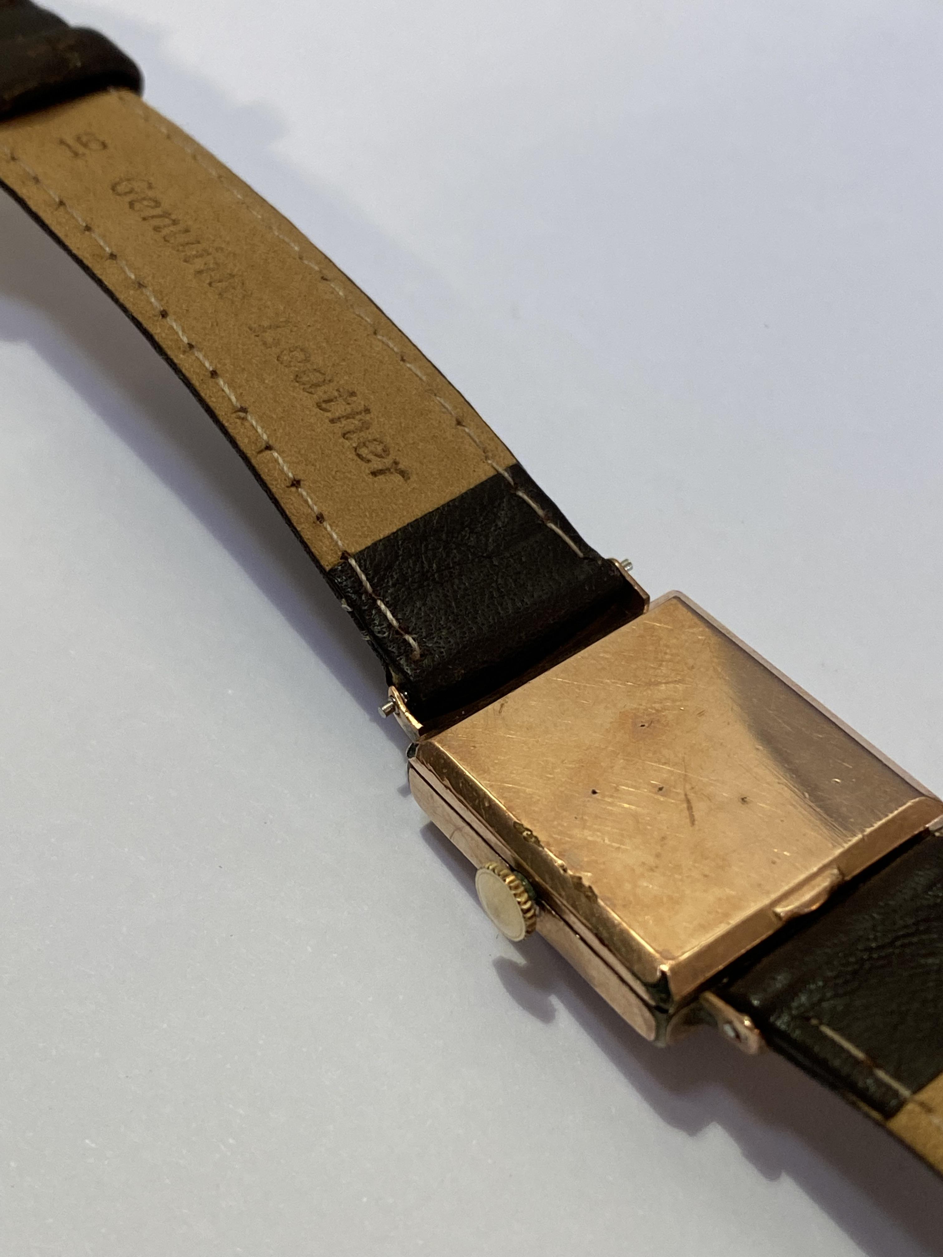 A Longines 10k gold-filled gentleman's wristwatch, c. 1930-40, the rectangular copper finish dial - Bild 2 aus 2