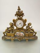 A French porcelain-mounted gilt-bronze mantel clock, c. 1880, the cream enamel dial with Roman
