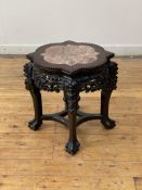 A late 19th century Chinese rosewood jardiniere stand, the top inset with breche violette marble