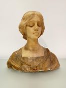 An Italian carved alabaster bust of a young Renaissance noblewoman, from the Workshop of Antonio