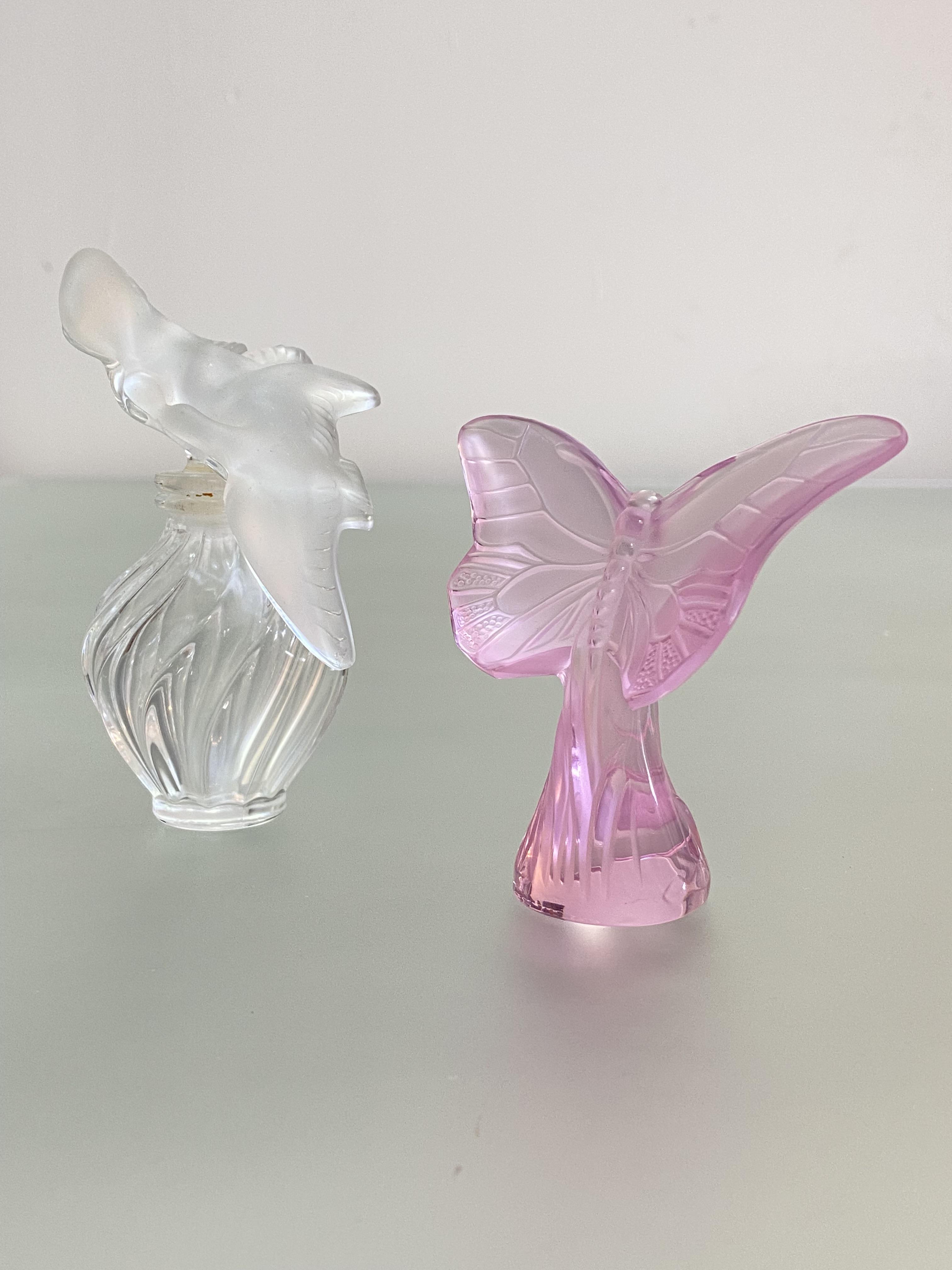 Lalique: a pink glass butterfly, Papillon, etched mark, Lalique, France; together with a Nina