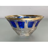 A Murano glass bowl, the panelled sides enriched with a band of blue raised panels, gilt painted
