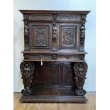 A Victorian oak buffet, incorporating some 17th/ 18th century elements, the dentil cornice over