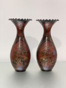 A pair of large Satsuma pottery vases, late 19th century, of baluster form, with everted frilly rim,