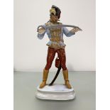 A large Herend porcelain figure of a Hadik Hussar, on an integral oval plinth, blue printed, stamped
