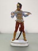 A large Herend porcelain figure of a Hadik Hussar, on an integral oval plinth, blue printed, stamped