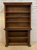 A mid 19th century mahogany open bookcase, the projecting cornice over three adjustable shelves,