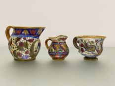 A group of late 19th century Italian copper lustre-glazed maiolica comprising: a cup with serpent