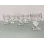 A set of seven early 19th century glass rummers, each ogee bowl with a band of fruiting vine over