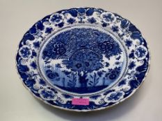 De Klauw, a Dutch Delft blue and white charger, second half of the 18th century, painted to the well