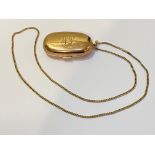 An Edwardian 9ct gold double sovereign case on a tracelink chain, hallmarked for Birmingham 1909,