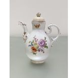 A 19th century Meissen chocolate pot, of baluster form, with osier-moulded neck, double C-scroll