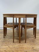 Hans Olsen for Frem Rølje, a Danish Roundette mid century teak extending dining table and chairs,