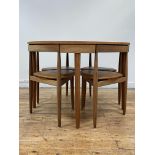 Hans Olsen for Frem Rølje, a Danish Roundette mid century teak extending dining table and chairs,