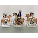 A group of three 19th century Staffordshire polychrome painted flatback figures comprising: a
