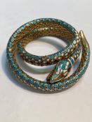 A Continental 935 silver and enamel coiled serpent bracelet, c. 1920, stamped marks (a/f). 38 grams
