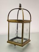 A late 19th/early 20th century gilt-brass and cut-glass hall lantern, the oblong frame with four