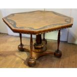 A Victorian walnut centre table, the octagonal top with quarter sawn veneer framed within an