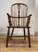An elm and ash Windsor chair, early 19th century, the double hoop and spindle back with pierced