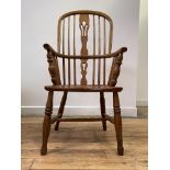 An elm and ash Windsor chair, early 19th century, the double hoop and spindle back with pierced