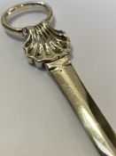 An early George III silver meat skewer, London 1764 (maker's mark indistinct), with shell-cast