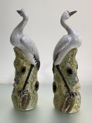 A pair of Chinese porcelain models of cranes, probably early 20th century, in Export style, each