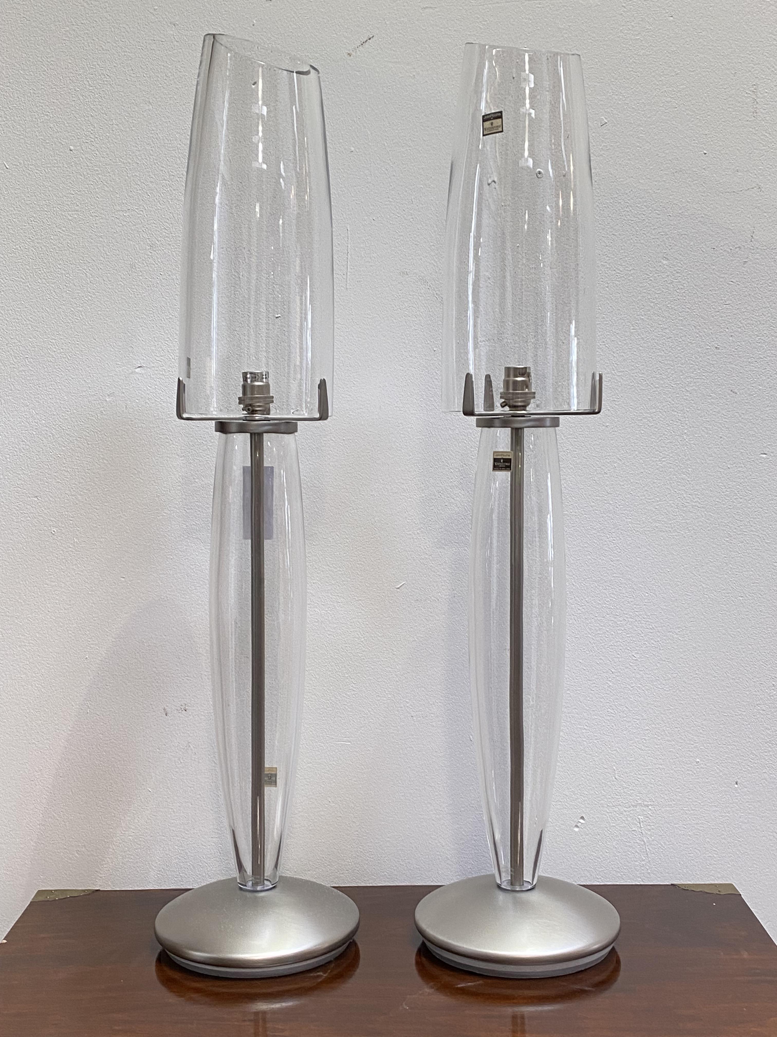 John Rocha for Waterford, a pair of "Seal" lamps, each in clear glass with brushed nickel base.