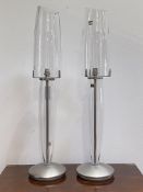 John Rocha for Waterford, a pair of "Seal" lamps, each in clear glass with brushed nickel base.