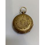 A Swiss 14ct gold lady's fob watch, c. 1900, the gilt dial and chapter ring with Roman numerals,