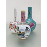 Three Chinese porcelain bottle vases: the first painted with flowers and water lilies against a