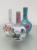 Three Chinese porcelain bottle vases: the first painted with flowers and water lilies against a