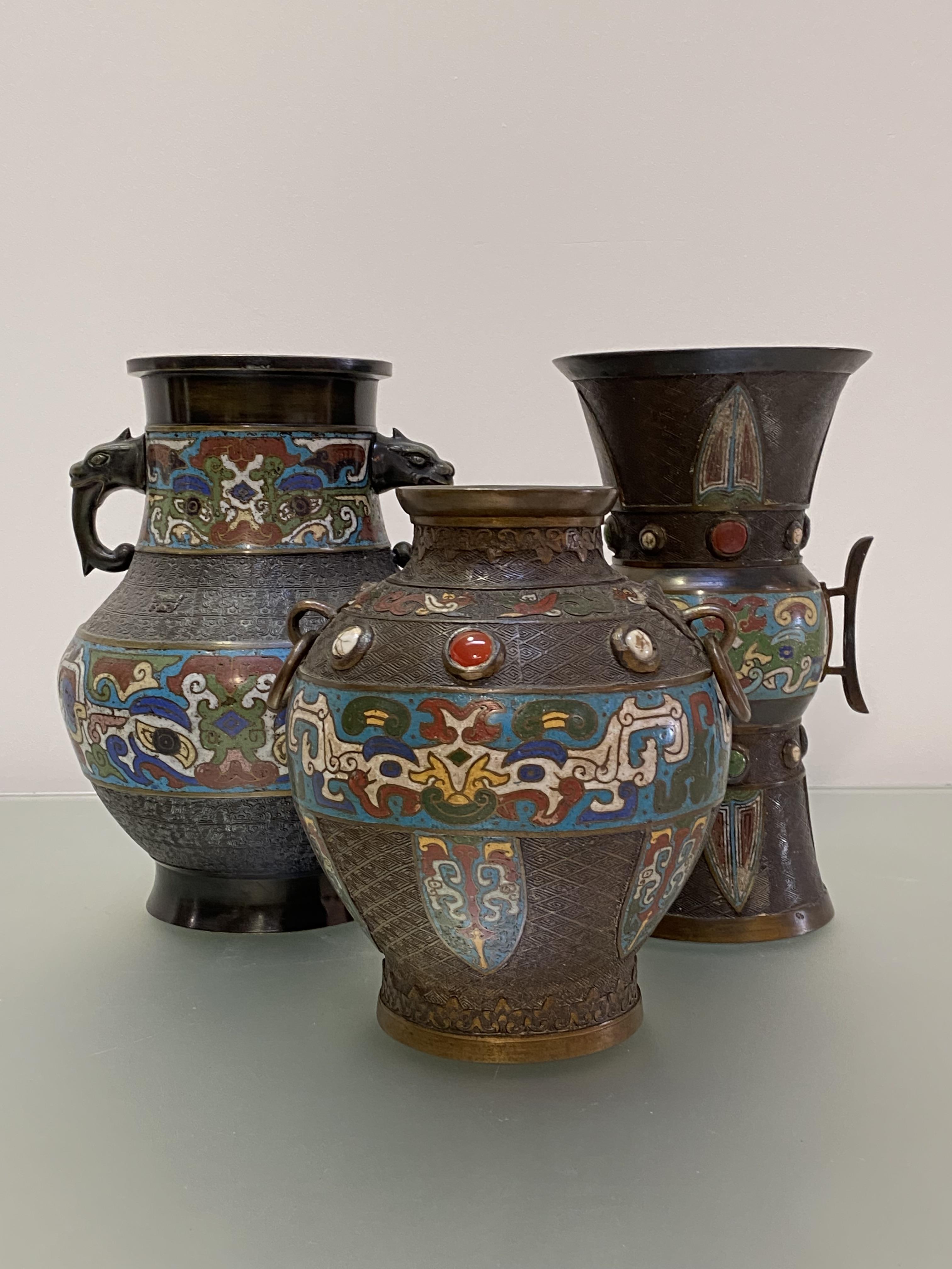 Three Chinese patinated bronze and enamel vessels in the Archaic style, comprising: a baluster