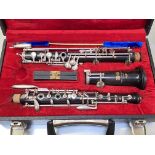 An English oboe, Ward & Winterbourn, London, with nickel-plated mounts, each section stamped "