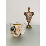 A small Russian porcelain teapot, Kuznetsov, late 19th century, of bullet form, decorated with