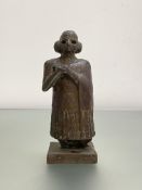 A patinated bronze figure of a Sumerian (Mesopotamia) female worshipper, modelled after originals