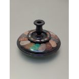 A late 19th century specimen hardstone desk stand, of circular form, inlaid with a ropetwist pattern