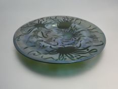 Anita Pate (Scottish, Contemporary), Small Fish with Kelp, a blue lustre glass dish or plaque,