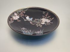 A Japanese cloisonne enamel plate, c. 1900, decorated with birds perched on a flowering bough