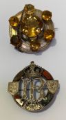 Two 19th century Scottish silver (unmarked) brooches: the first, circular, set to the centre with