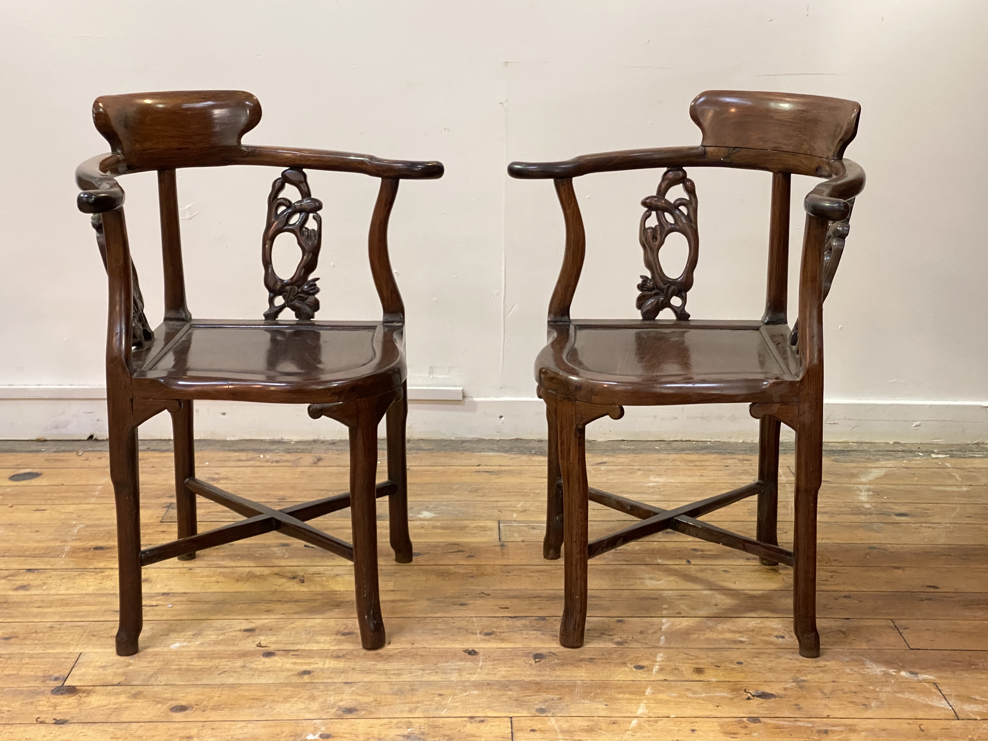 A pair of 19th century Chinese rosewood corner chairs, each with shaped crest rail over naturalistic - Image 4 of 4