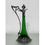 A Jugendstil emerald green glass and silver-plated claret jug, c. 1890, W.M.F., the flared glass jug